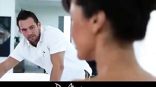 Brunette with fake boobs gets oiled up and fucked hard in this hot video