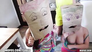 Two girls wear bags on their heads and have sex with guys