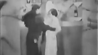 Sexual women have fun with two guys in an ancient scene from the 30s