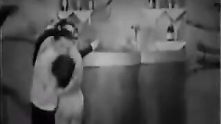Sexual women have fun with two guys in an ancient scene from the 30s