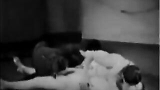 Sexual women have fun with two guys in an ancient scene from the 30s