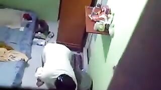 Spy camera installed in the room of a girl in the hostel to peep at her