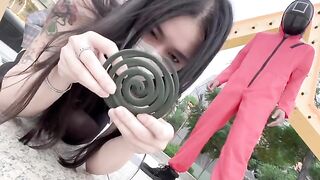 A hot Chinese girl participates in a daring twist of the Squid Game challenge