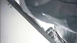 The hidden camera at the checkout shoots girls under their skirts