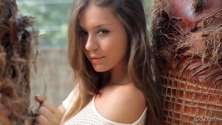 Young Russian beauty strips and dances erotic for the camera