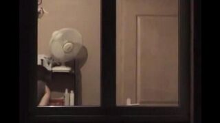 He admires to himself in the mirror, standing completely naked in front of him
