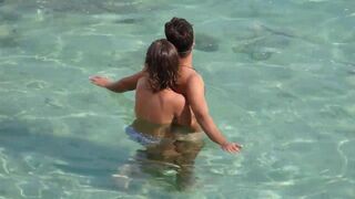 A girl demonstrates her finger-fucking skills to a guy at sea