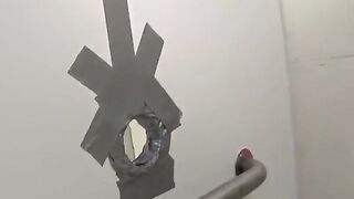 A girl is having fun with a guy in the toilet of the club