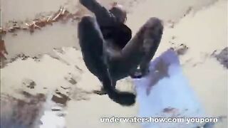 A naked girl is having fun in the swimming pool, capturing erotic moments underwater