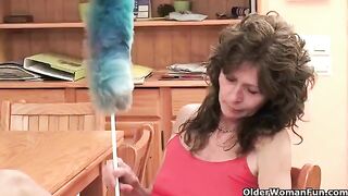 A mature woman plays with her pussy using her fingers to masturbate