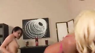 Two lesbians fuck each other wearing only skirts in the bedroom