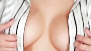 Beautiful brunette with big natural tits passionately playing with them