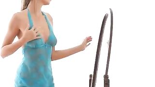 The girl is fond of erotic moves in front of the mirror