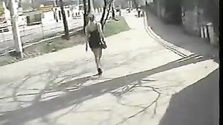 A young girl is having fun with three older men at once