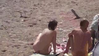 Bunch of naked girls bathing in the sea