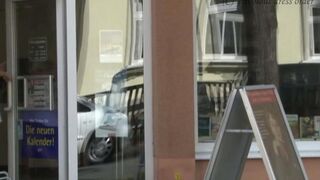 A sexy girl is walking without panties on the street