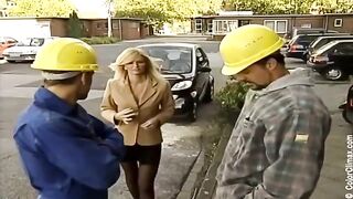 A sexy girl in black pantyhose makes a blowjob on the porn set