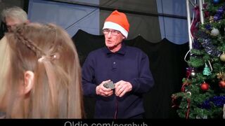 Old people in a crowd got intimate with the beautiful Snow Maiden