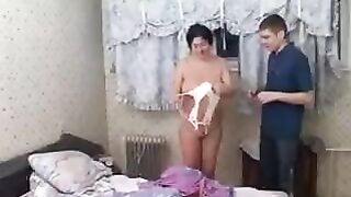 The young guy is fucking his old mother in a taboo encounter