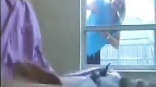 A woman peeps on a guy jerking off in the ward