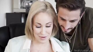 Overworked and tired, a hot blonde is masturbating in the office