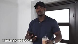 The pretty girl is putting on sexy clothes to meet the delivery guy