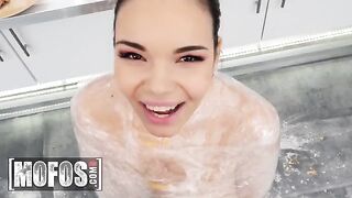 The hot brunette babe Sofia Lee helps in the kitchen