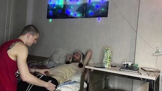 A cute girl has sex with two guys at a party, showcasing her petite frame in action