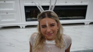 A cute girl got her face decorated with cream in a playful prank
