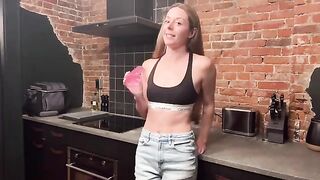 A reward for the beautiful girl in the form of kisses in the kitchen