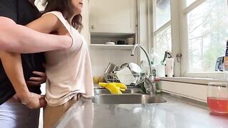 A hot MILF with big boobs gets fucked in the kitchen
