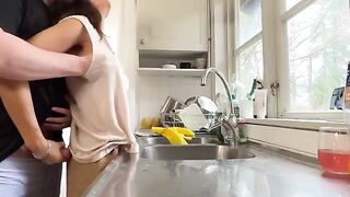 A hot MILF with big boobs gets fucked in the kitchen