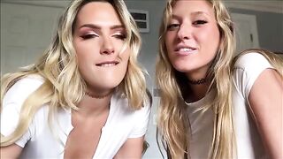 Two girls share the same big cock in an intense scene