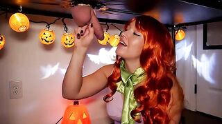 The red-haired beauty Daphne serves a hot treat on Halloween