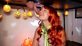 The red-haired beauty Daphne serves a hot treat on Halloween