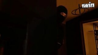 A busty housewife gets fucked by a masked burglar in doggy style