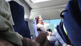 A busty MILF gets her big tits out on the bus and wanks it