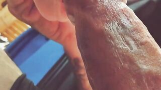 A girl with a silicone mouth works outdoors and moans