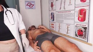 A doctor conducts a thorough oral examination of a patient in a fake hospital setting