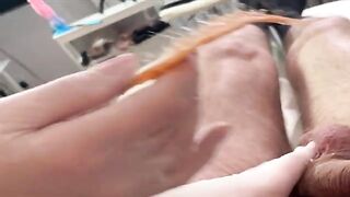 A hot Russian girl waxes her client’s cock in a steamy session