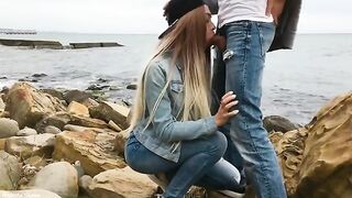 A sexy girl has sex with a guy with a big cock outdoors