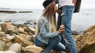 A sexy girl has sex with a guy with a big cock outdoors